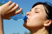 Woman Drinking Bottled Water